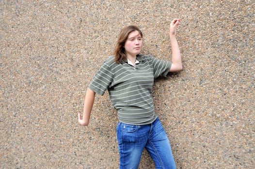 Female tomboy posing outside.