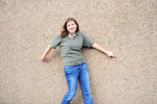 Female tomboy posing outside.