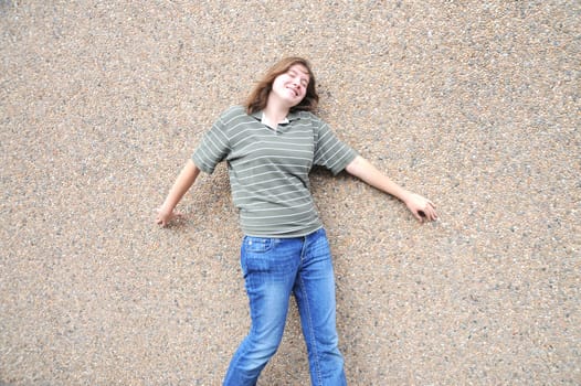 Female tomboy posing outside.