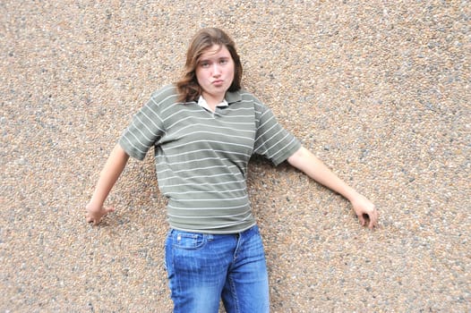 Female tomboy posing outside.