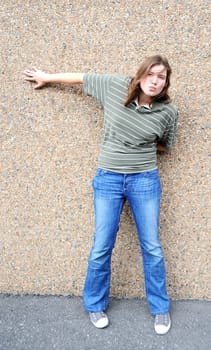 Female tomboy posing outside.