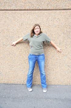 Female tomboy posing outside.