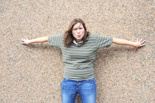 Female tomboy posing outside.