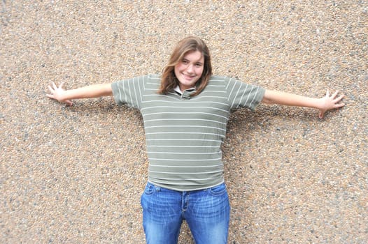 Female tomboy posing outside.