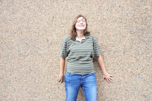 Female tomboy posing outside.