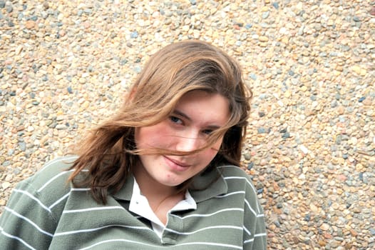 Female tomboy posing outside.