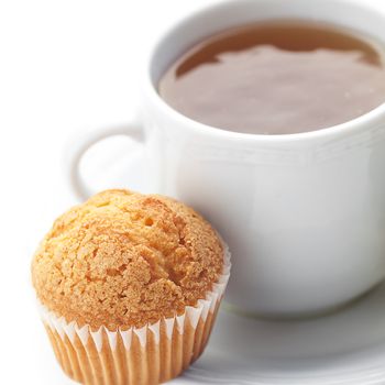 cup of tea and muffin isolated on white