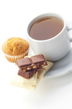 bar of chocolate,tea and muffin isolated on white