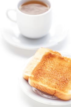 cup of tea and toast isolated on white