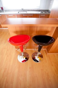 kitchen interior with bar chairs in the apartment