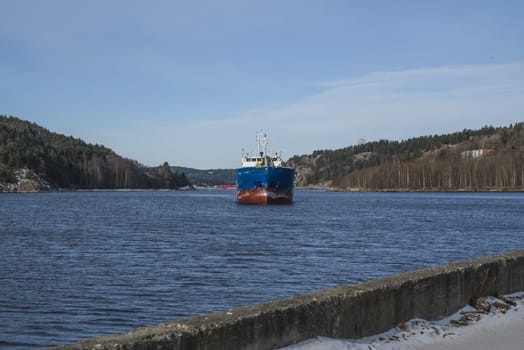 The vessel Bal Bulk arriving at the port of Halden, Norway. The picture is shot one day in March 2013.
