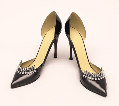 Women's black shoes closeup on a light background