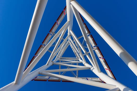 abstract modern technology structure in color over blue sky