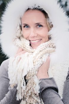 portrait of a happy young woman smiling in autumn