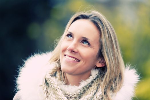 Closeup portrait of a happy young woman smiling 