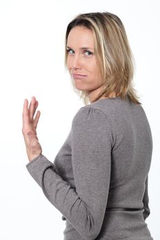 bored lady blowing on white background 