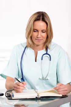 portrait of blond woman doctor in hospital