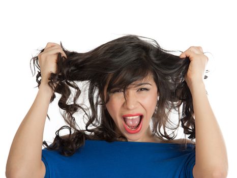 Angered by a woman screaming and tearing his hair