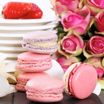 Dessert on valentine's with macaroons, coffee and strawberry