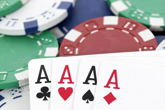 chips and four aces of a kind, poker
