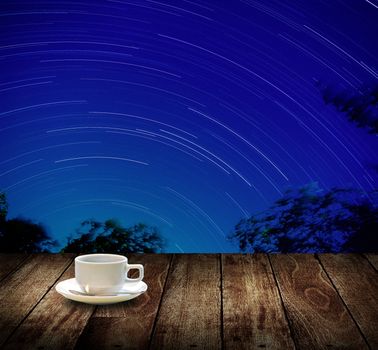 Drink coffee cup with star trails background