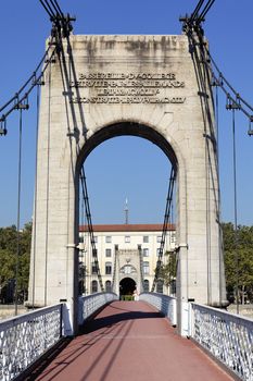 Lyon city with red footbridge on Rhone river