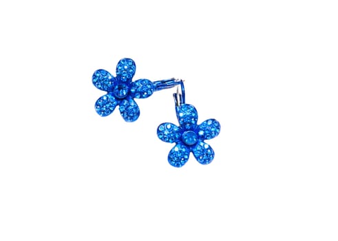 blue earrings in the shape of flowers on a white background