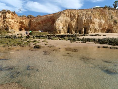 A section of the idyllic Praia de Rocha beach on the Algarve region. 