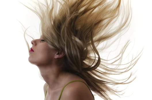 portrait of a woman with hair flying in the air on white background