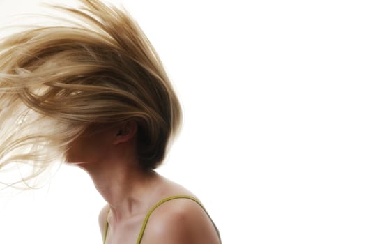 portrait of a woman with hair flying in the air on white background