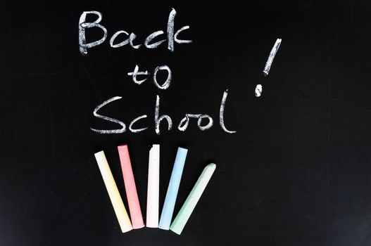 Back to school - written with chalk on a blackboard