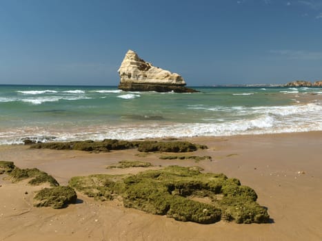 A section of the idyllic Praia de Rocha beach on the Algarve region. 