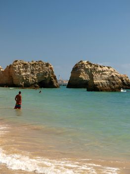 A section of the idyllic Praia de Rocha beach on the Algarve region. 