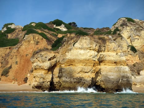 A section of the idyllic Praia de Rocha beach on the Algarve region. 