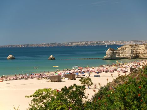 A section of the idyllic Praia de Rocha beach on the Algarve region. 