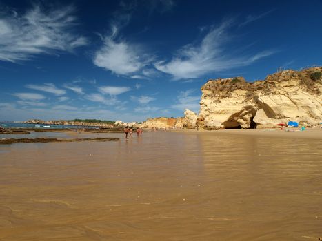 A section of the idyllic Praia de Rocha beach on the Algarve region. 