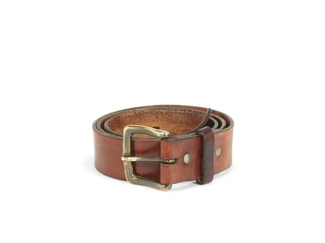old brown leather belt on white background