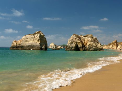 A section of the idyllic Praia de Rocha beach on the Algarve region. 