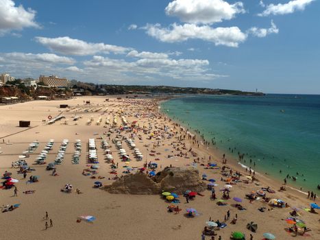 A section of the idyllic Praia de Rocha beach on the Algarve region. 