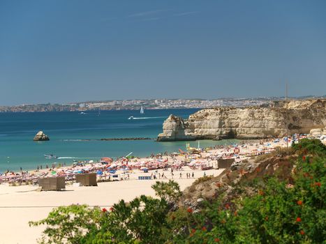 A section of the idyllic Praia de Rocha beach on the Algarve region. 