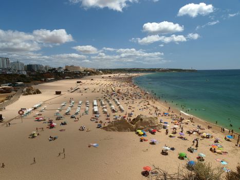 A section of the idyllic Praia de Rocha beach on the Algarve region. 