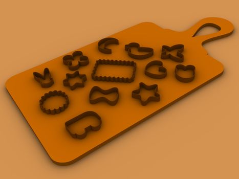 Thirteen molds for baking cookies set on a cutting board