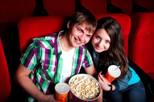 couple in a movie theater, watching a 3D movie