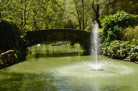 Stone bridge in Maria Luisa park, Seville, Andalusia (Spain)