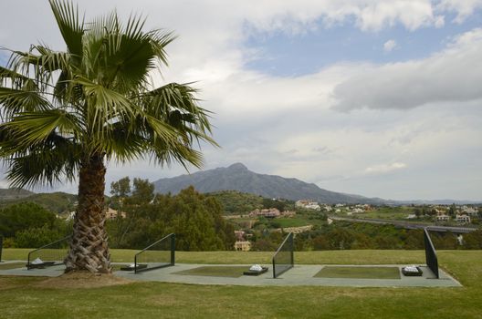 Practice golf tee with view to the mountain in Marbella, Andalusia, Spain.