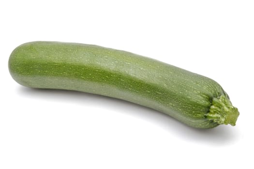 green zucchini closeup on white background