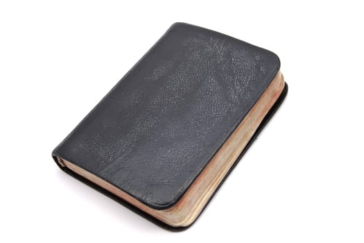 Black book closeup on white background