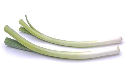 fresh green onions isolated on white background 
