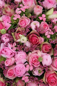 Mixed pink wedding arrangement, various flowers