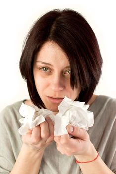 sneezing woman holding tissues, allergy or cold flu concept
